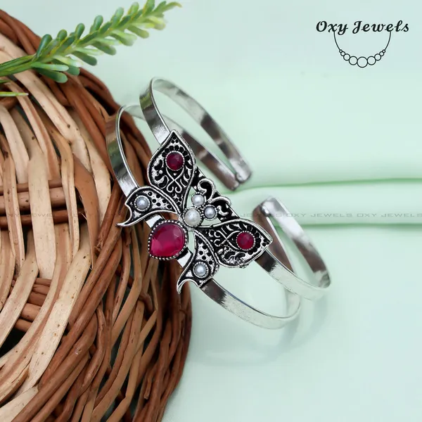 Vintage_Butterfly_Design_Silver_Bracelet_with_Red_Gemstones