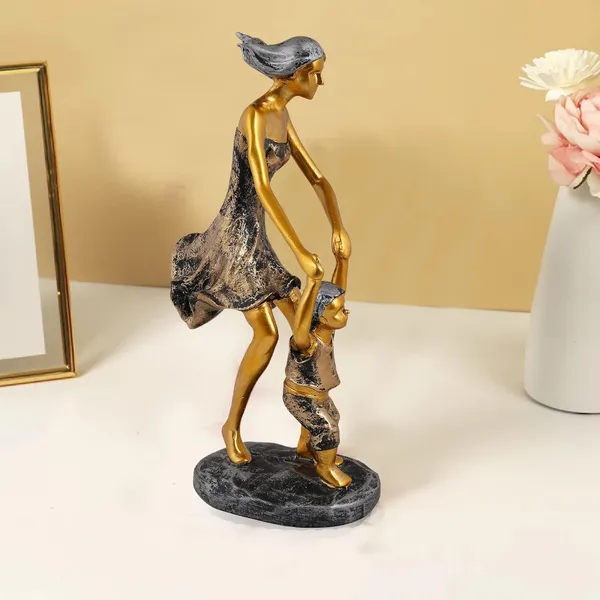 Handcrafted_Mother_Child_Statue_of_Black_and_Golden_Color_|_For_Home_Decor