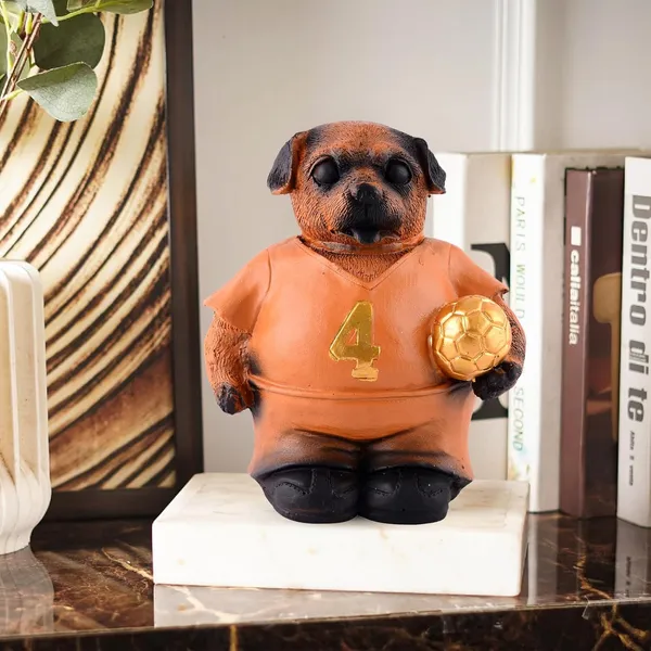 Dog_Figurine_with_Football_Showpiece_of_Orange_Color_|_Radiance_Look_for_Home_Decor