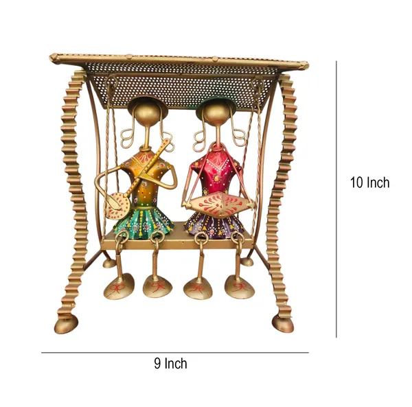 Handcrafted_Gold-Tone_Musical_Swing_Figurine_with_Colorful_Tribal_Accents