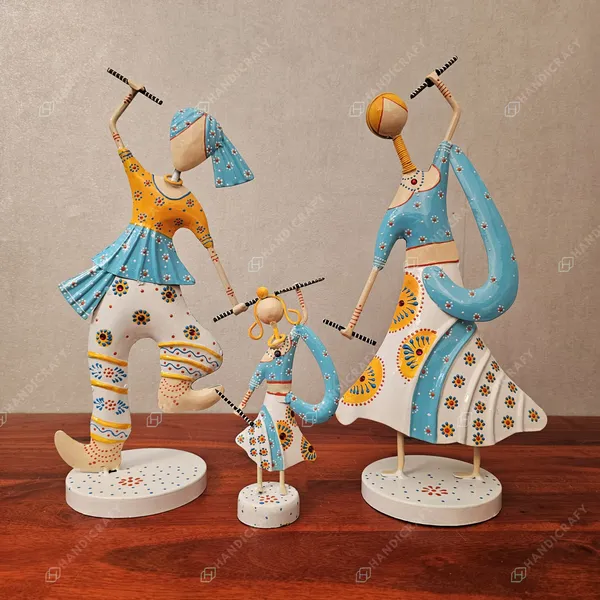 Handcrafted_Tribal_Dance_Trio_Sculpture_-_Vibrant_Metal_Art_for_Home_Decor_(Set_of_3)