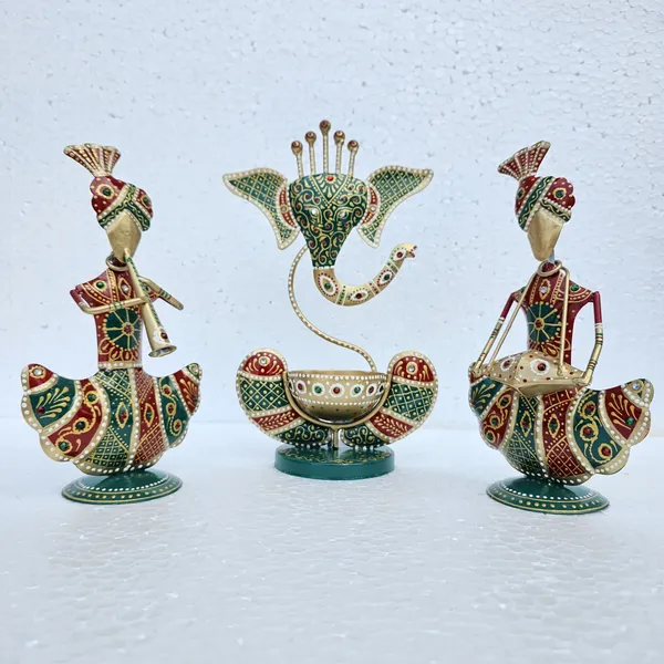 Handcrafted_Metal_Rajasthani_Tribal_Musician_Sitting_Showpiece_with_Ganesh_Urli_Diya_Set_of_3_(9_Inch)