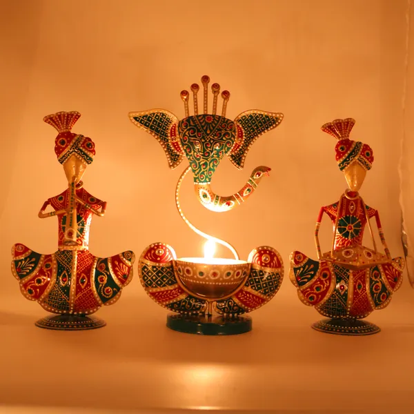 Handcrafted_Metal_Rajasthani_Tribal_Musician_Sitting_Showpiece_with_Ganesh_Urli_Diya_Set_of_3_(9_Inch)