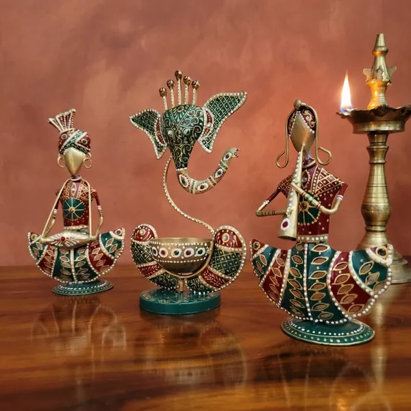 Metal_Rajasthani_Tribal_T-light_Musician_Sitting_Showpiece_with_Ganesh_Diya_Set_of_3_(11_Inch)