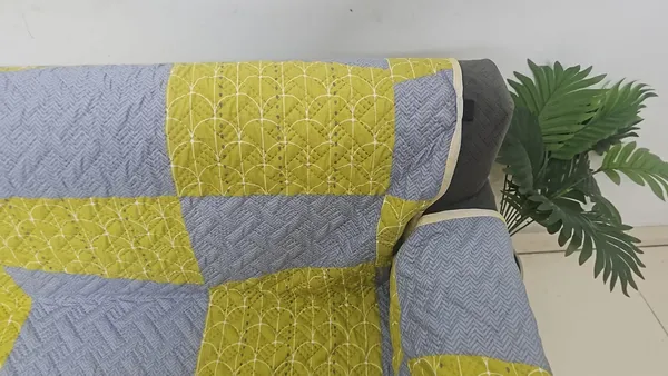 Polyester_Quilted_Printed_Sofa_Cover_for_3_Seater_Sofa_with_Pockets_on_Armrest_Cover