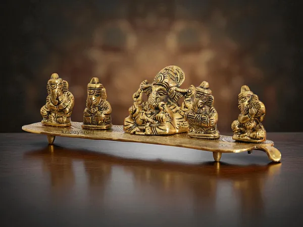 White_Metal_Gold_Plated_Ganesha_On_Leaf_With_Musical_Instrument_Metal_Statue_For_Pooja