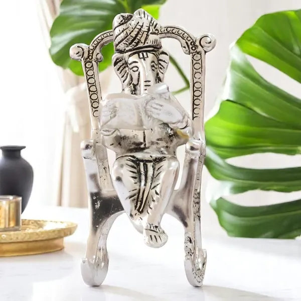 Metal_Chair_Ganesh_ganpati_Idol_with_Reading_Ramayan