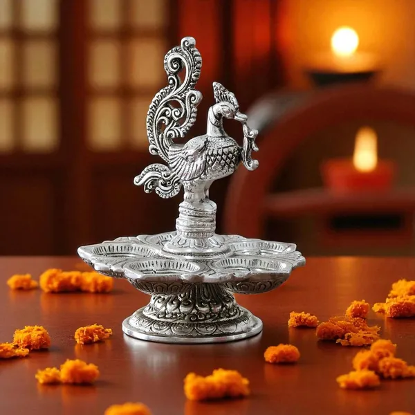 Traditional_Silver-Plated_Peacock_Pooja_Thali,_5-Compartment_Diya_Stand_with_Ornate_Design