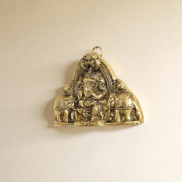 Ganesh_Wall_Hanging_with_Elephants_for_Door_Entrance_Decorative_Showpiece_-_12_cm_(Aluminium,_Gold)