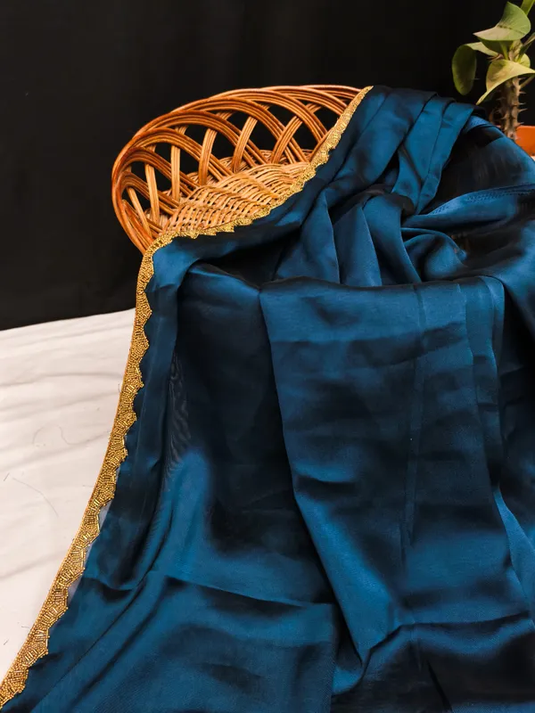 New_Party_Wear_Rangoli_Silk_Rama_color_saree_with_Blouse_and_stone_lace_Border