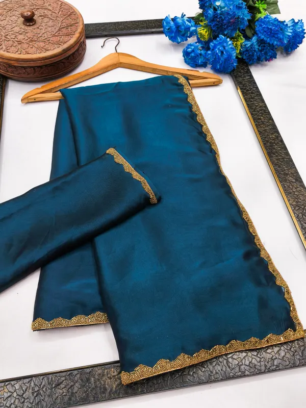 New_Party_Wear_Rangoli_Silk_Rama_color_saree_with_Blouse_and_stone_lace_Border