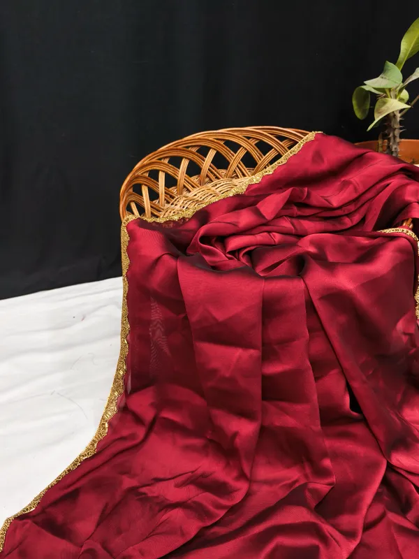 New_Party_Wear_Rangoli_Silk_Maroon_color_saree_with_Blouse_and_stone_lace_Border