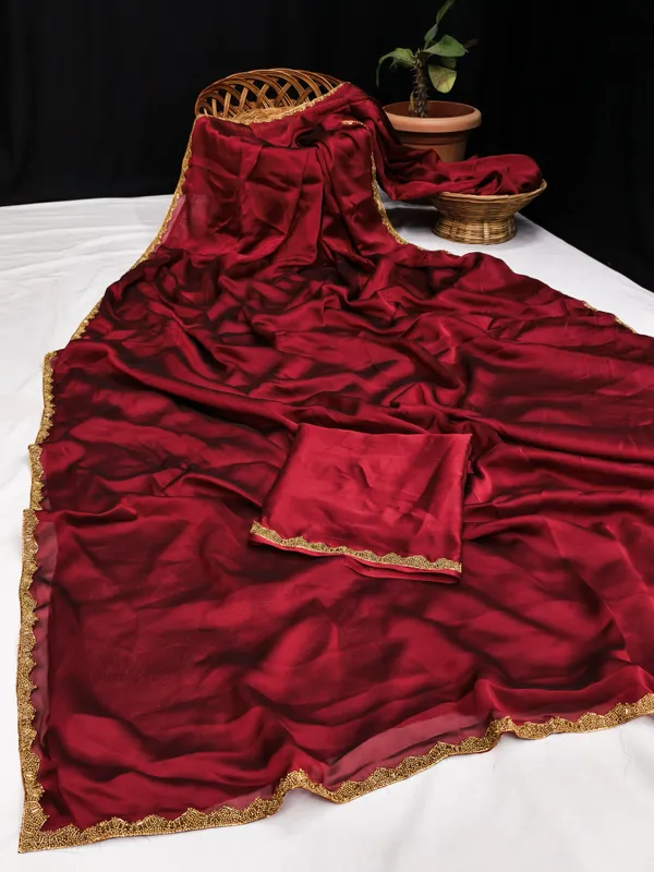 New_Party_Wear_Rangoli_Silk_Maroon_color_saree_with_Blouse_and_stone_lace_Border