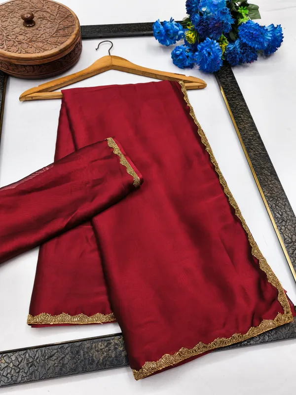 New_Party_Wear_Rangoli_Silk_Maroon_color_saree_with_Blouse_and_stone_lace_Border