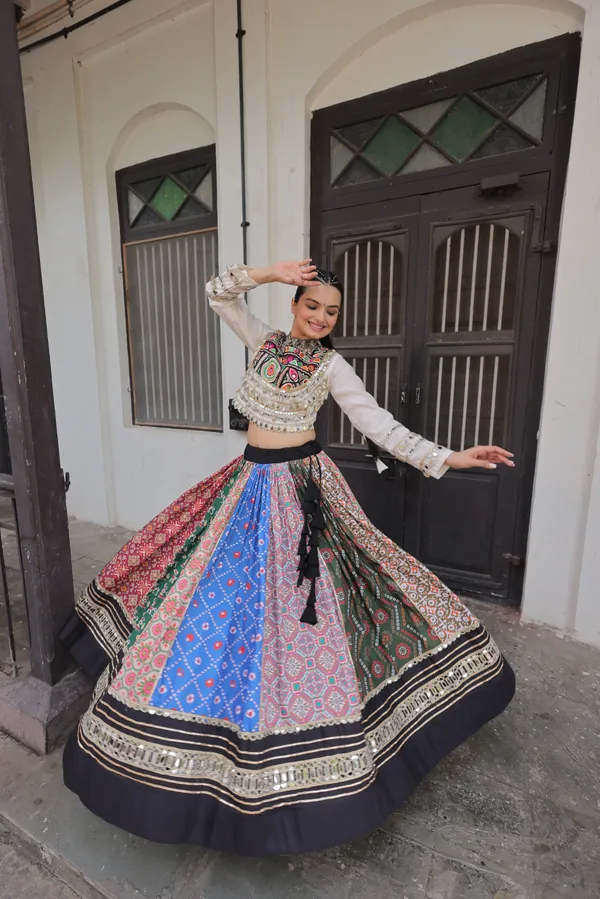 Beautiful_Cotton_Printed_Lehenga_featuring_attractive_Gota-Patti_and_real_mirror_lace_work,_paired_with_a_fully_stitched_blouse_�_perfect_for_a_vibrant_and_festive_Navratri_look._???