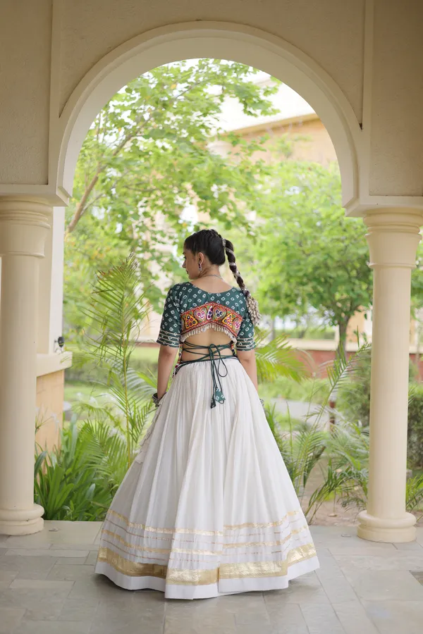 Celebrate_Navratri_festive_vibes_with_this_traditional_&_stylish_Lehenga_with_Blouse,_perfect_for_dance,_devotion_&_togetherness._Available_in_vibrant_colors_with_a_stitched_half_sleeves_blouse_�_ready_to_wear.