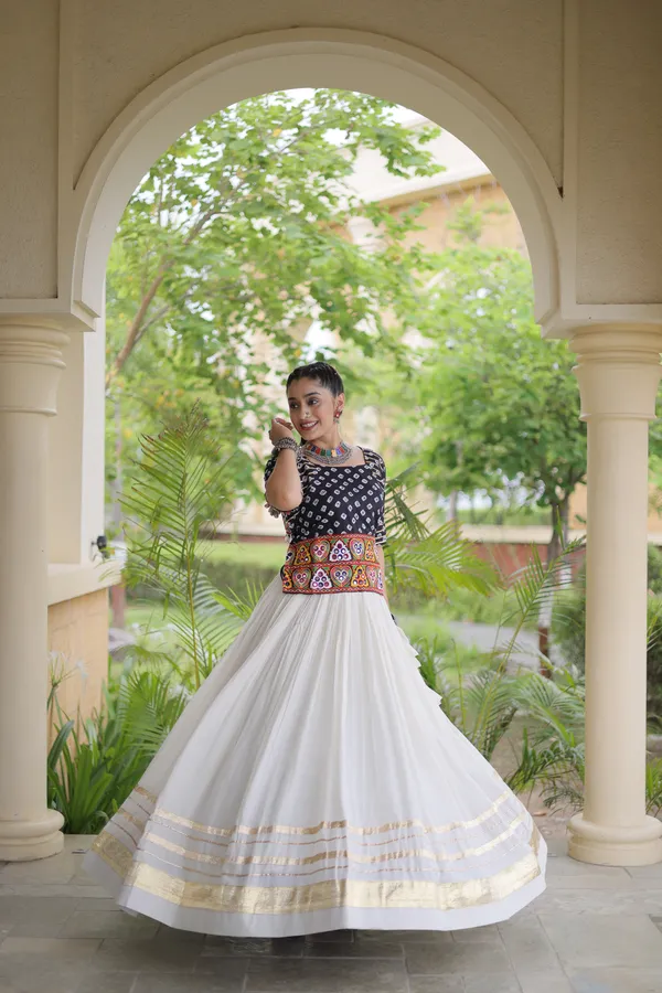 Celebrate_Navratri_festive_vibes_with_this_traditional_&_stylish_Lehenga_with_Blouse,_perfect_for_dance,_devotion_&_togetherness._Available_in_vibrant_colors_with_a_stitched_half_sleeves_blouse_�_ready_to_wear.