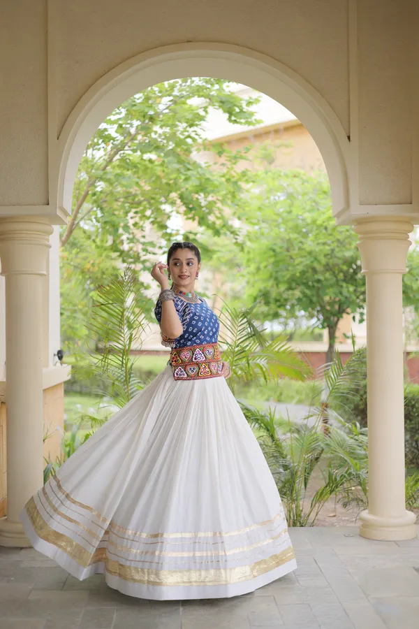Celebrate_Navratri_festive_vibes_with_this_traditional_&_stylish_Lehenga_with_Blouse,_perfect_for_dance,_devotion_&_togetherness._Available_in_vibrant_colors_with_a_stitched_half_sleeves_blouse_�_ready_to_wear.