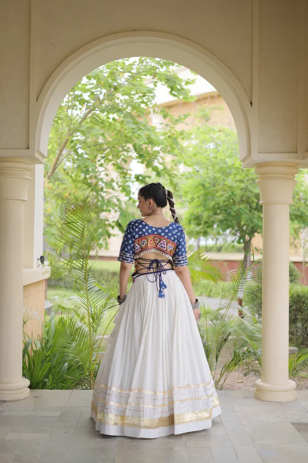Celebrate_Navratri_festive_vibes_with_this_traditional_&_stylish_Lehenga_with_Blouse,_perfect_for_dance,_devotion_&_togetherness._Available_in_vibrant_colors_with_a_stitched_half_sleeves_blouse_�_ready_to_wear.