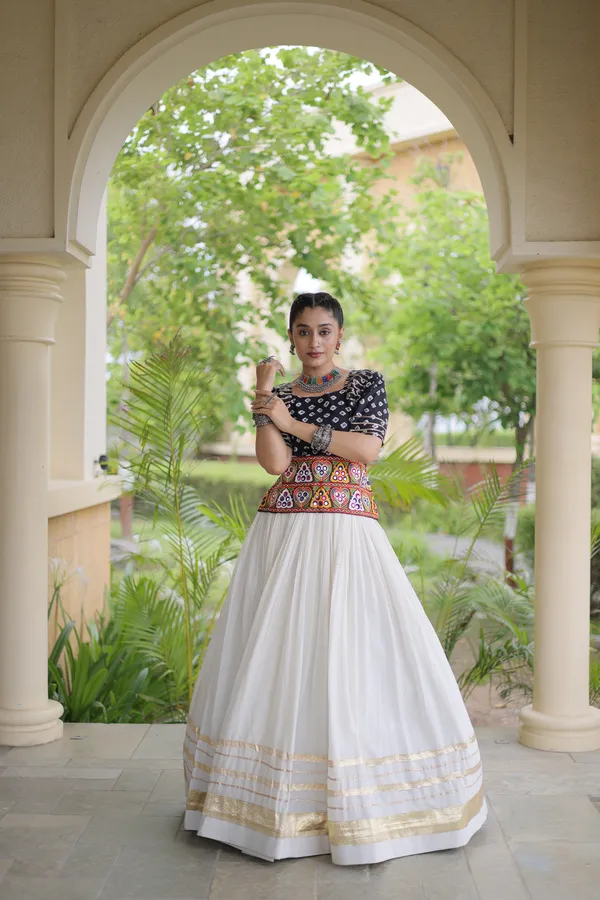 Celebrate_Navratri_festive_vibes_with_this_traditional_&_stylish_Lehenga_with_Blouse,_perfect_for_dance,_devotion_&_togetherness._Available_in_vibrant_colors_with_a_stitched_half_sleeves_blouse_�_ready_to_wear.