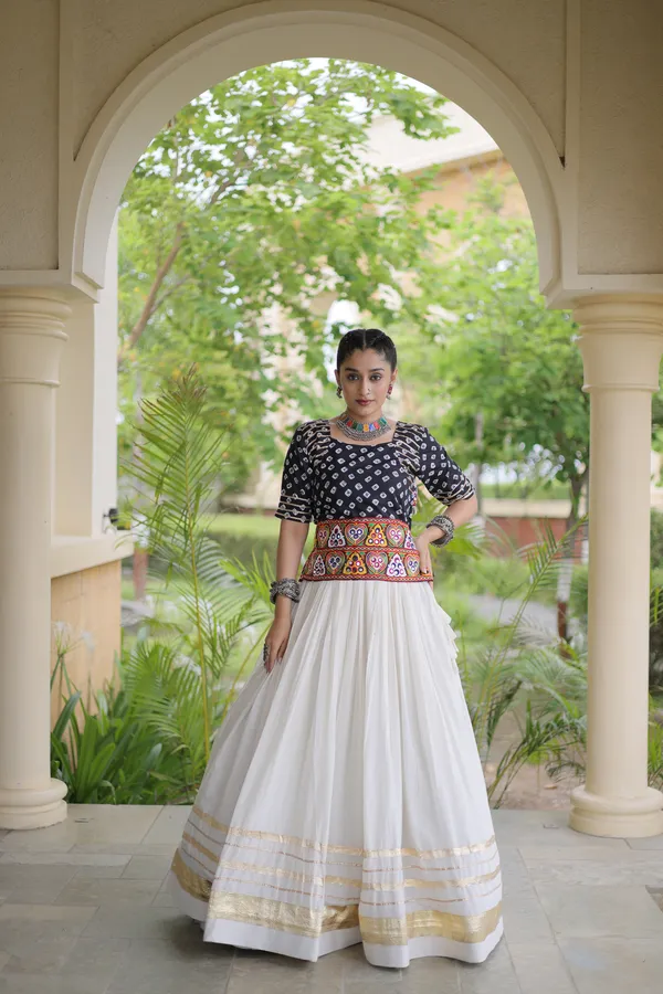Celebrate_Navratri_festive_vibes_with_this_traditional_&_stylish_Lehenga_with_Blouse,_perfect_for_dance,_devotion_&_togetherness._Available_in_vibrant_colors_with_a_stitched_half_sleeves_blouse_�_ready_to_wear.