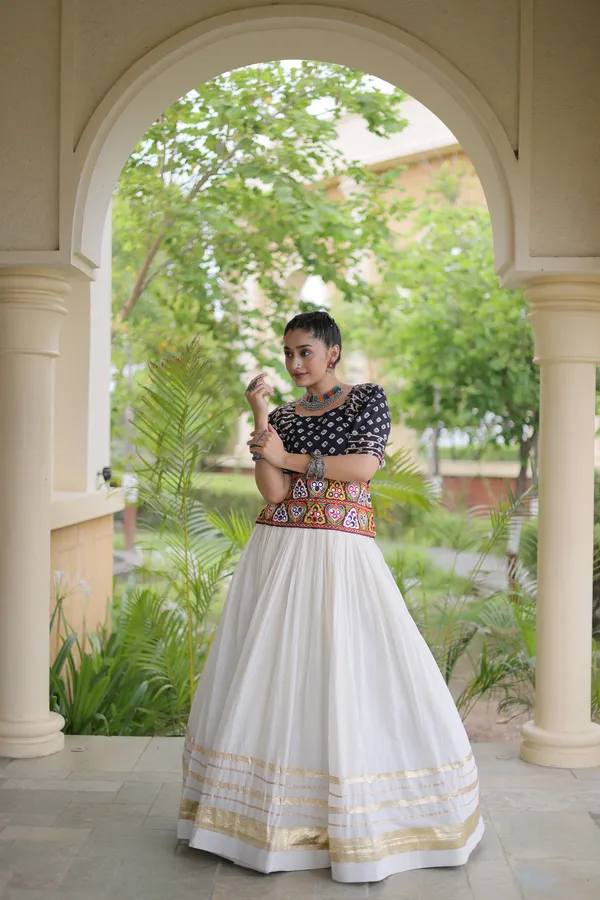 Celebrate_Navratri_festive_vibes_with_this_traditional_&_stylish_Lehenga_with_Blouse,_perfect_for_dance,_devotion_&_togetherness._Available_in_vibrant_colors_with_a_stitched_half_sleeves_blouse_�_ready_to_wear.
