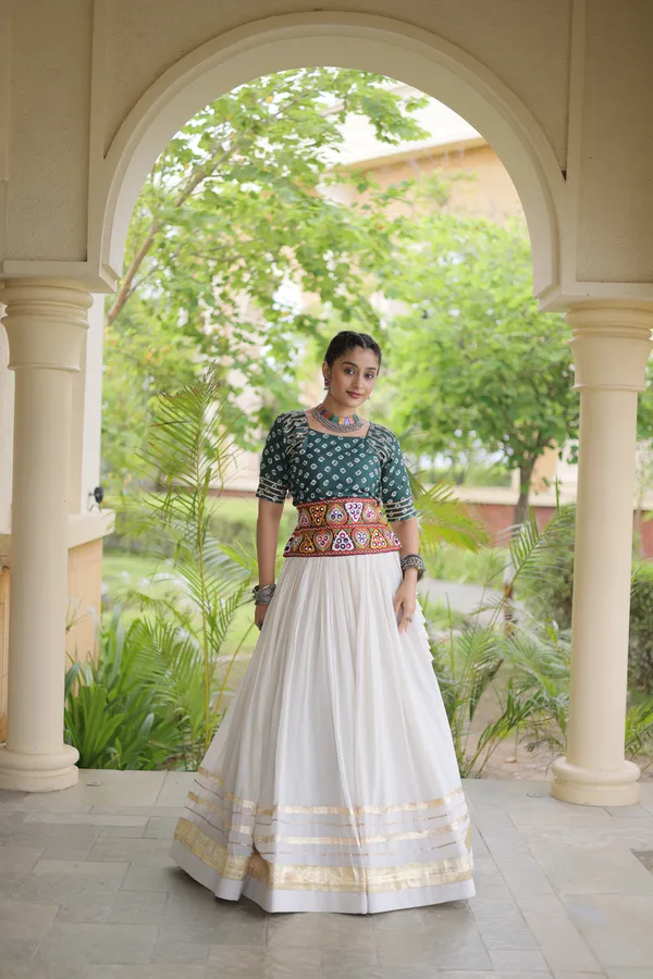 Celebrate_Navratri_festive_vibes_with_this_traditional_&_stylish_Lehenga_with_Blouse,_perfect_for_dance,_devotion_&_togetherness._Available_in_vibrant_colors_with_a_stitched_half_sleeves_blouse_�_ready_to_wear.