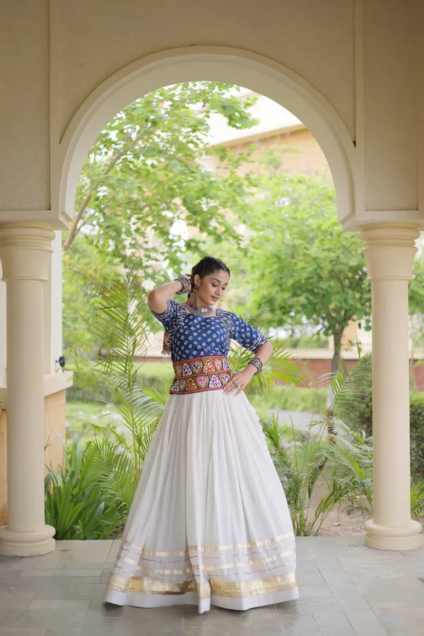 Celebrate_Navratri_festive_vibes_with_this_traditional_&_stylish_Lehenga_with_Blouse,_perfect_for_dance,_devotion_&_togetherness._Available_in_vibrant_colors_with_a_stitched_half_sleeves_blouse_�_ready_to_wear.