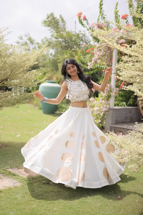 Celebrate_Navratri_festive_vibes_with_this_traditional_&_stylish_Lehenga_with_Top,_perfect_for_dance,_devotion_&_togetherness._Available_in_vibrant_colors_with_a_stitched_blouse_�_ready_to_wear.