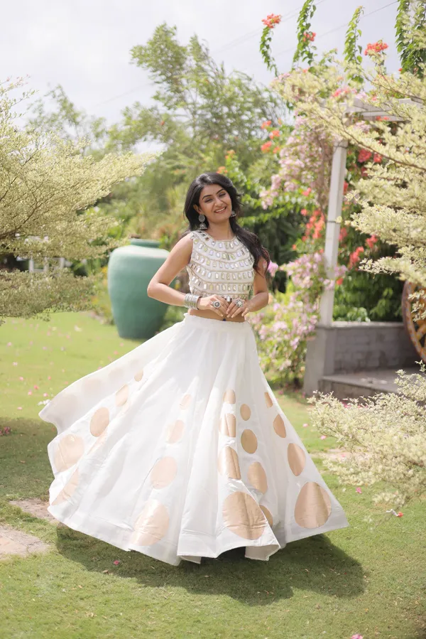Celebrate_Navratri_festive_vibes_with_this_traditional_&_stylish_Lehenga_with_Top,_perfect_for_dance,_devotion_&_togetherness._Available_in_vibrant_colors_with_a_stitched_blouse_�_ready_to_wear.