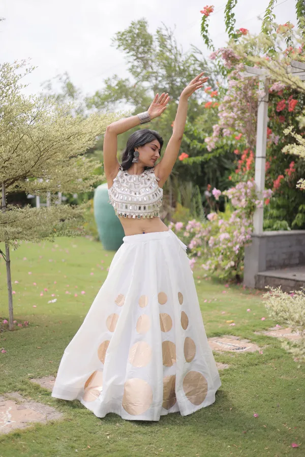 Celebrate_Navratri_festive_vibes_with_this_traditional_&_stylish_Lehenga_with_Top,_perfect_for_dance,_devotion_&_togetherness._Available_in_vibrant_colors_with_a_stitched_blouse_�_ready_to_wear.