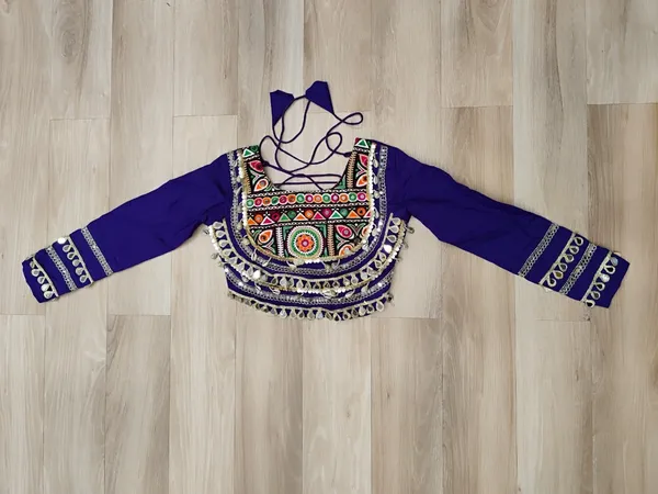 Celebrate_true_Navratri_vibes_with_this_traditional_&_spiritual_outfit_that_beautifully_blends_festive_fun_with_cultural_charm._Choose_from_vibrant_colors_in_this_Lehenga_with_Top,_perfect_for_dancing,_devotion,_and_the_joy_of_togetherness._Comes_with_fully_stitched_lehenga_&_blouse_for_a_ready-to-wear_festive_look._???