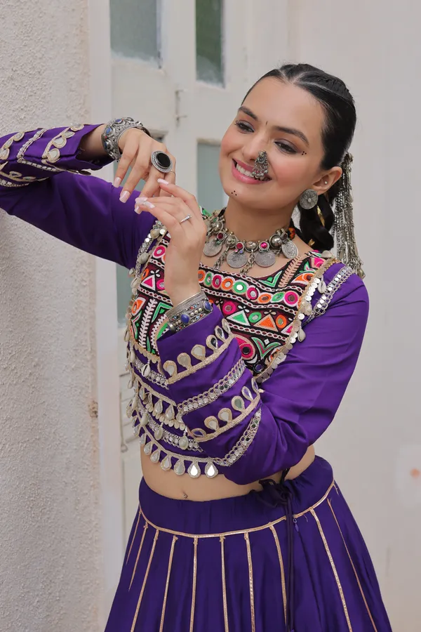 Celebrate_true_Navratri_vibes_with_this_traditional_&_spiritual_outfit_that_beautifully_blends_festive_fun_with_cultural_charm._Choose_from_vibrant_colors_in_this_Lehenga_with_Top,_perfect_for_dancing,_devotion,_and_the_joy_of_togetherness._Comes_with_fully_stitched_lehenga_&_blouse_for_a_ready-to-wear_festive_look._???