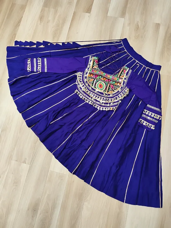Celebrate_true_Navratri_vibes_with_this_traditional_&_spiritual_outfit_that_beautifully_blends_festive_fun_with_cultural_charm._Choose_from_vibrant_colors_in_this_Lehenga_with_Top,_perfect_for_dancing,_devotion,_and_the_joy_of_togetherness._Comes_with_fully_stitched_lehenga_&_blouse_for_a_ready-to-wear_festive_look._???