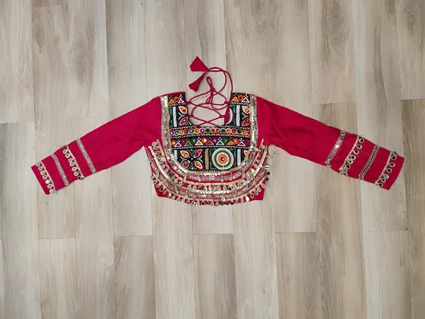 Celebrate_true_Navratri_vibes_with_this_traditional_&_spiritual_outfit_that_beautifully_blends_festive_fun_with_cultural_charm._Choose_from_vibrant_colors_in_this_Lehenga_with_Top,_perfect_for_dancing,_devotion,_and_the_joy_of_togetherness._Comes_with_fully_stitched_lehenga_&_blouse_for_a_ready-to-wear_festive_look._???