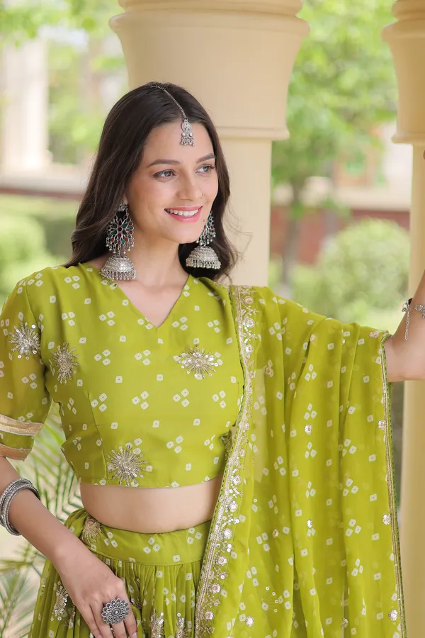 Comfortable_&_lightweight_four-color_Lehenga_Choli_with_Dupatta,_perfect_for_your_Navratri_festive_wardrobe._Stylish,_vibrant_&_easy_to_wear_�_comes_with_a_stitched_blouse_for_a_ready-to-wear_look.