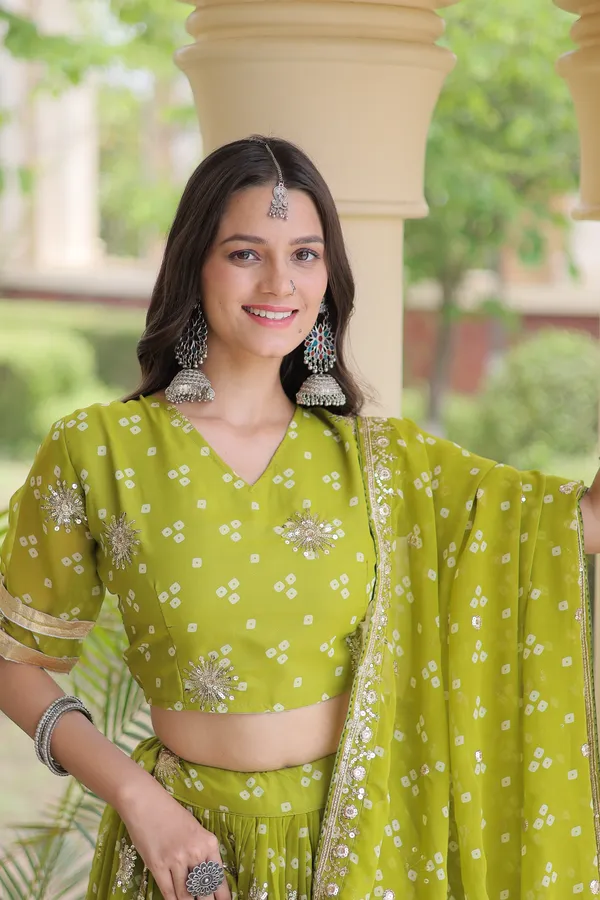 Comfortable_&_lightweight_four-color_Lehenga_Choli_with_Dupatta,_perfect_for_your_Navratri_festive_wardrobe._Stylish,_vibrant_&_easy_to_wear_�_comes_with_a_stitched_blouse_for_a_ready-to-wear_look.