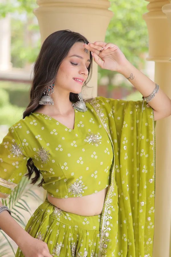 Comfortable_&_lightweight_four-color_Lehenga_Choli_with_Dupatta,_perfect_for_your_Navratri_festive_wardrobe._Stylish,_vibrant_&_easy_to_wear_�_comes_with_a_stitched_blouse_for_a_ready-to-wear_look.