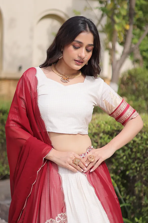 Comfortable_&_lightweight_white_Viscose_Jacquard_Lehenga_Choli_with_Dupatta,_perfect_for_your_Onam_festive_wardrobe._Elegant,_graceful_&_easy_to_wear_�_comes_with_an_unstitched_blouse_for_a_custom_fit.