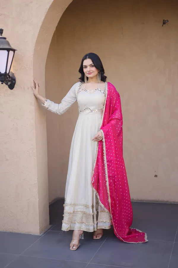 Cosmos_Lehenga_designed_with_real_mirror_and_zari_embroidered_lace_work,_giving_a_rich_and_festive_look._Comes_with_a_stitched_blouse_and_available_in_sizes_�_perfect_for_Navratri_&_celebrations.