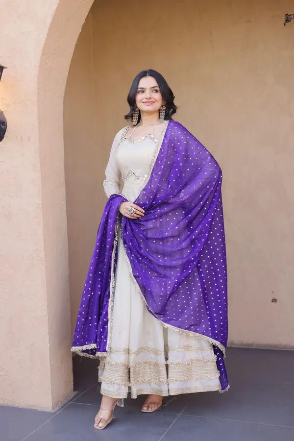 Cosmos_Lehenga_designed_with_real_mirror_and_zari_embroidered_lace_work,_giving_a_rich_and_festive_look._Comes_with_a_stitched_blouse_and_available_in_sizes_�_perfect_for_Navratri_&_celebrations.