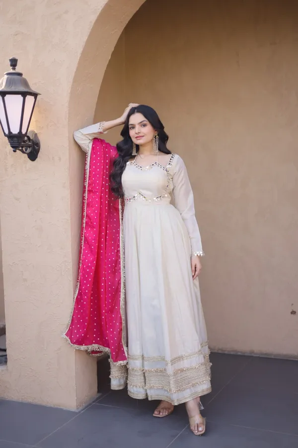 Cosmos_Lehenga_designed_with_real_mirror_and_zari_embroidered_lace_work,_giving_a_rich_and_festive_look._Comes_with_a_stitched_blouse_and_available_in_sizes_�_perfect_for_Navratri_&_celebrations.