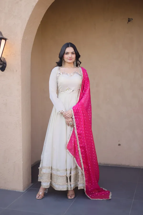Cosmos_Lehenga_designed_with_real_mirror_and_zari_embroidered_lace_work,_giving_a_rich_and_festive_look._Comes_with_a_stitched_blouse_and_available_in_sizes_�_perfect_for_Navratri_&_celebrations.