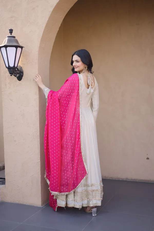 Cosmos_Lehenga_designed_with_real_mirror_and_zari_embroidered_lace_work,_giving_a_rich_and_festive_look._Comes_with_a_stitched_blouse_and_available_in_sizes_�_perfect_for_Navratri_&_celebrations.