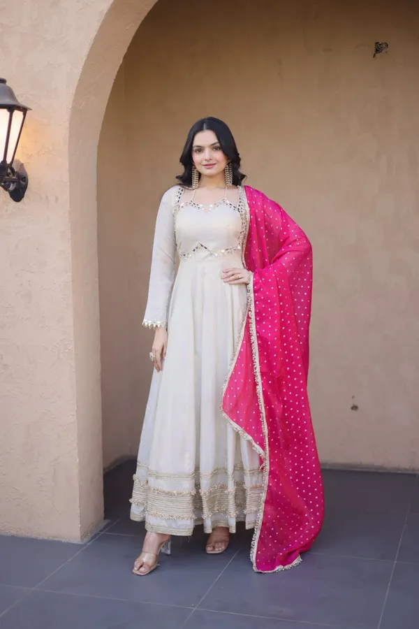 Cosmos_Lehenga_designed_with_real_mirror_and_zari_embroidered_lace_work,_giving_a_rich_and_festive_look._Comes_with_a_stitched_blouse_and_available_in_sizes_�_perfect_for_Navratri_&_celebrations.