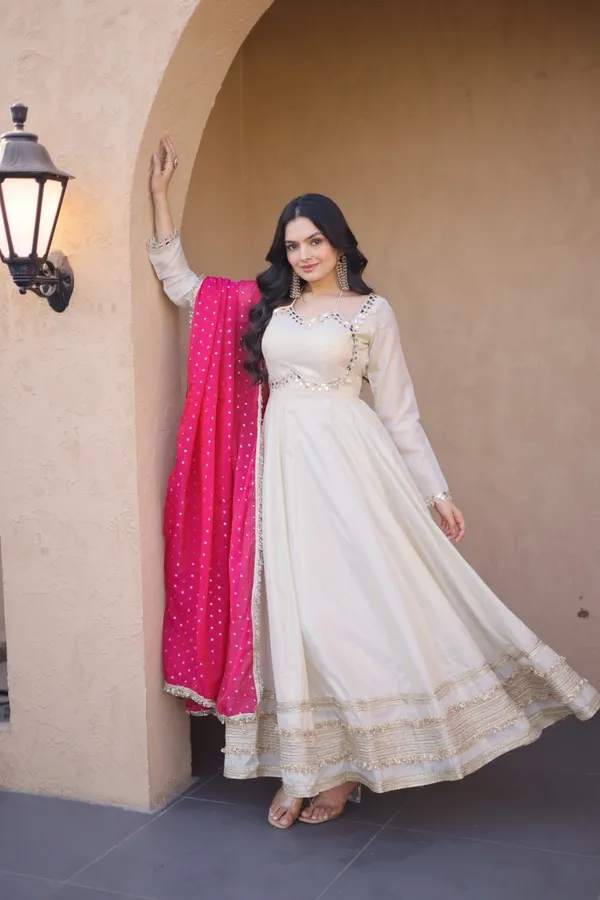 Cosmos_Lehenga_designed_with_real_mirror_and_zari_embroidered_lace_work,_giving_a_rich_and_festive_look._Comes_with_a_stitched_blouse_and_available_in_sizes_�_perfect_for_Navratri_&_celebrations.