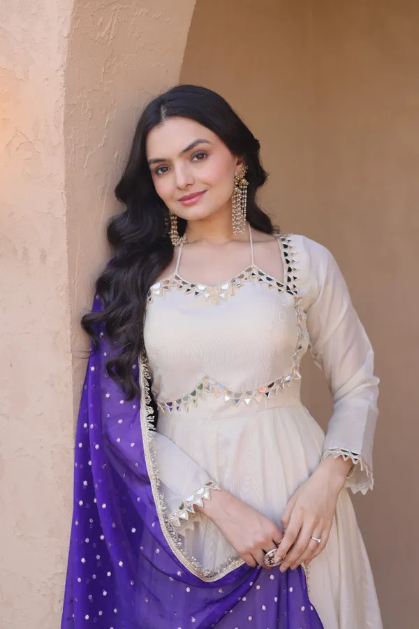 Cosmos_Lehenga_designed_with_real_mirror_and_zari_embroidered_lace_work,_giving_a_rich_and_festive_look._Comes_with_a_stitched_blouse_and_available_in_sizes_�_perfect_for_Navratri_&_celebrations.
