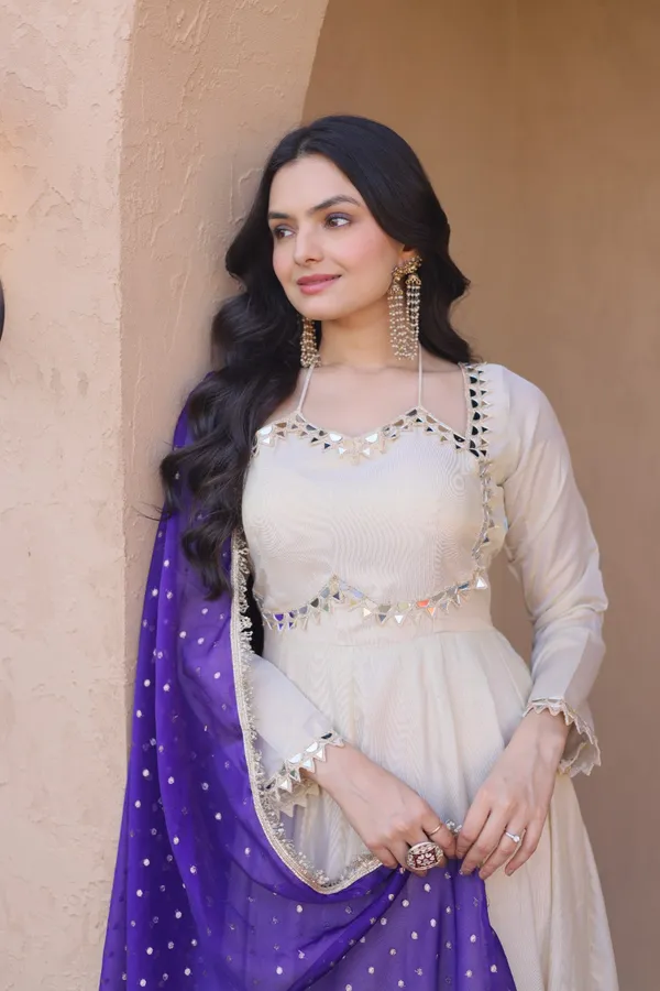 Cosmos_Lehenga_designed_with_real_mirror_and_zari_embroidered_lace_work,_giving_a_rich_and_festive_look._Comes_with_a_stitched_blouse_and_available_in_sizes_�_perfect_for_Navratri_&_celebrations.