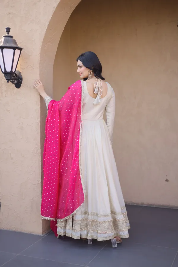 Cosmos_Lehenga_designed_with_real_mirror_and_zari_embroidered_lace_work,_giving_a_rich_and_festive_look._Comes_with_a_stitched_blouse_and_available_in_sizes_�_perfect_for_Navratri_&_celebrations.