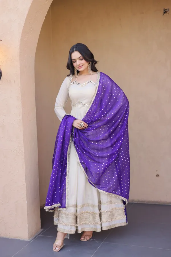 Cosmos_Lehenga_designed_with_real_mirror_and_zari_embroidered_lace_work,_giving_a_rich_and_festive_look._Comes_with_a_stitched_blouse_and_available_in_sizes_�_perfect_for_Navratri_&_celebrations.
